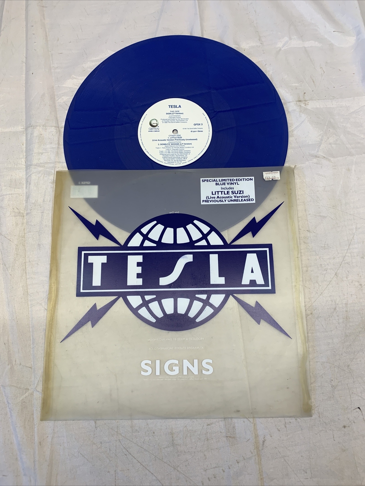 Tesla – Signs – Bild 5